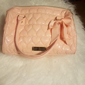 A light pink purse